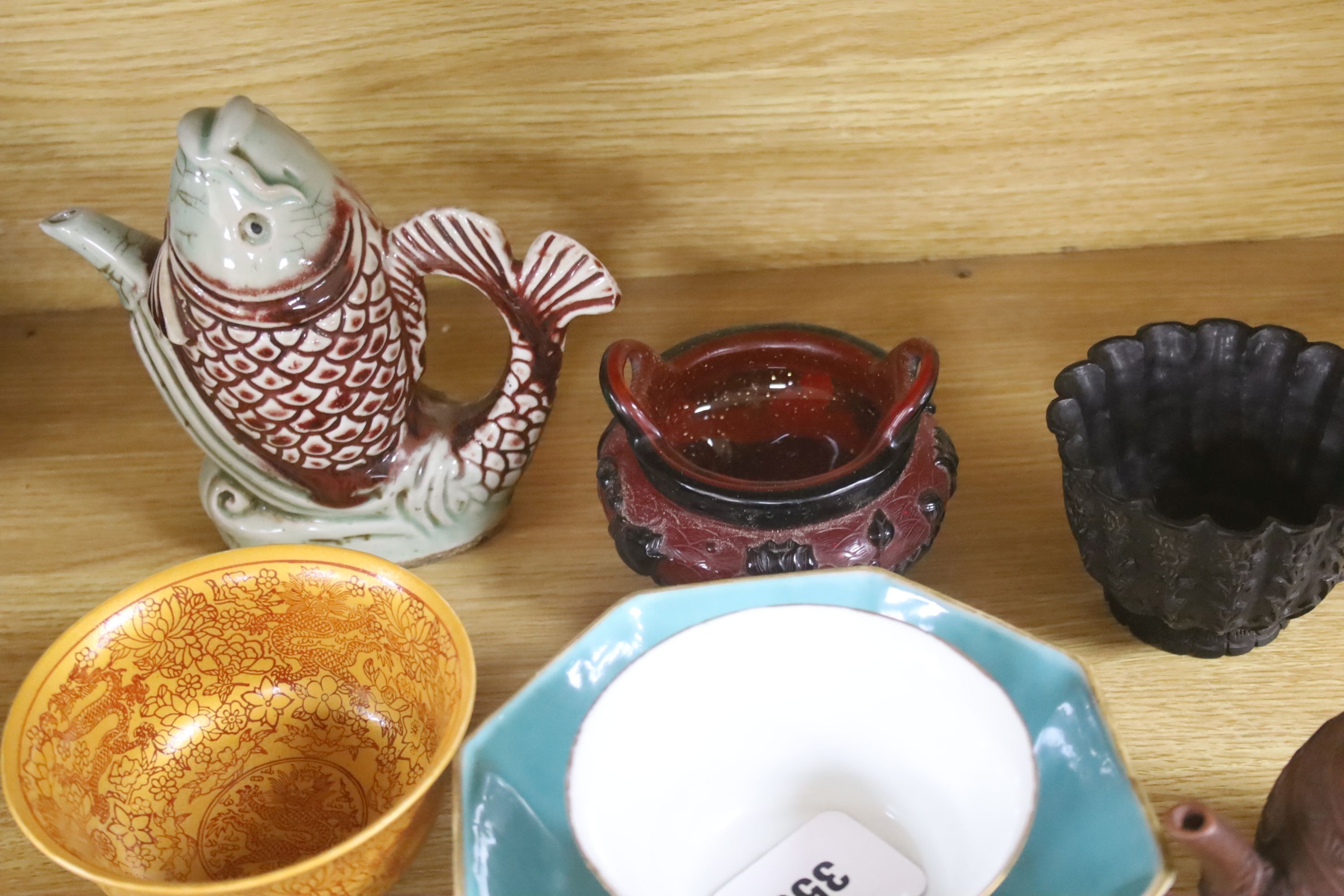 A Chinese small famille rose vase, a similar bowl, a Chinese eight trigrams bowl, Yixing teapot, two glass vessels etc